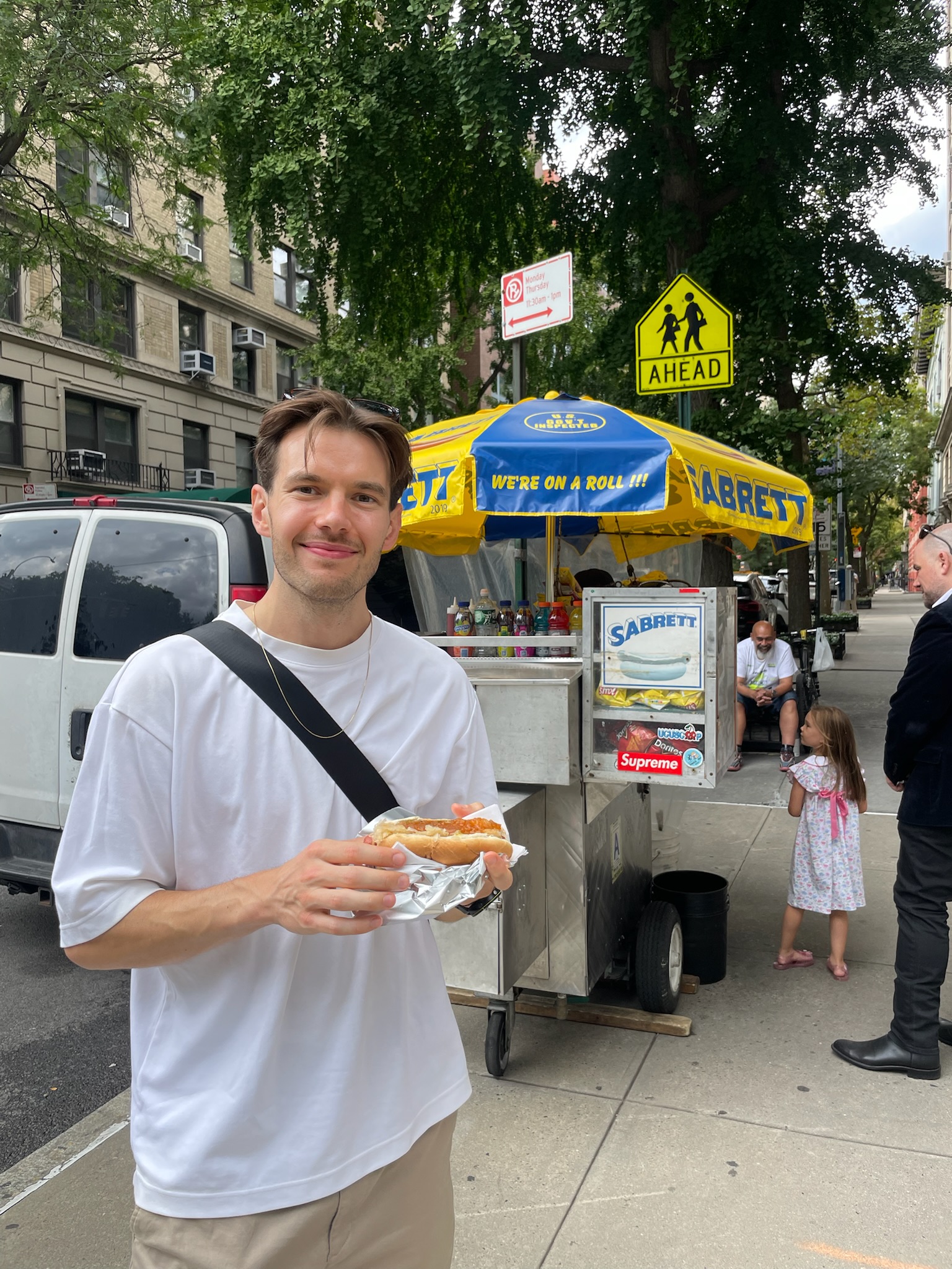 Daniel eating his food in New York