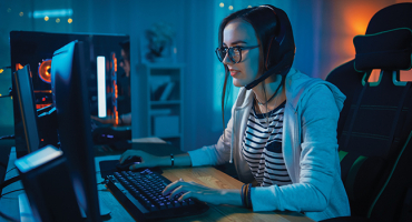 woman gaming on a comuputer