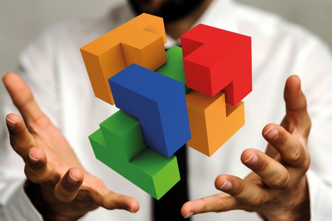 Man holding a cube