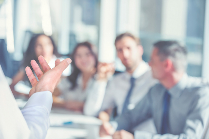 Blurred scene of businesspeople in a meeting