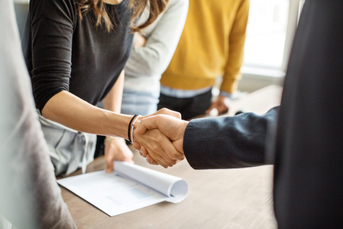 business people shaking hands