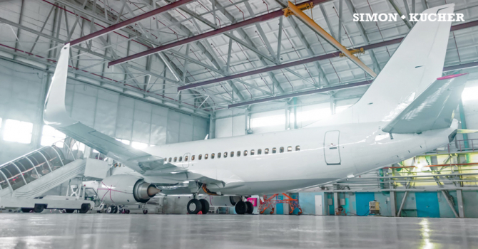 plane standing in hangar