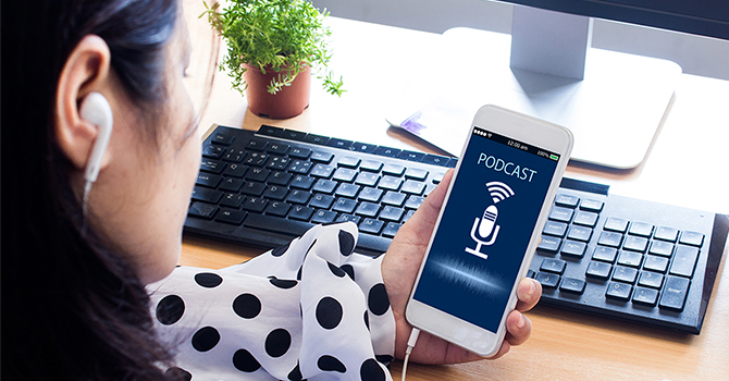 Woman listening to podcast