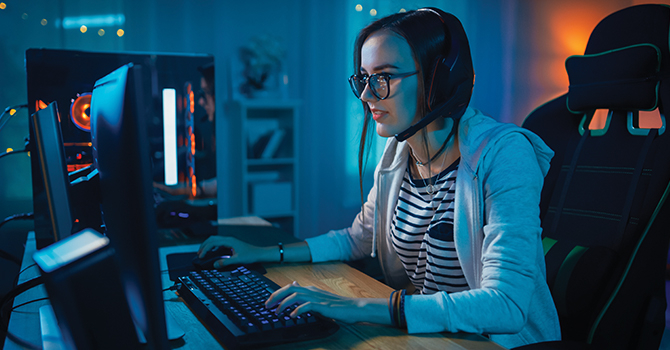 woman gaming on a comuputer