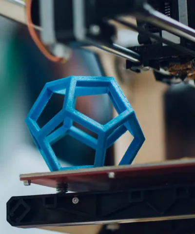 Close up of 3D printing a pentagonal prism