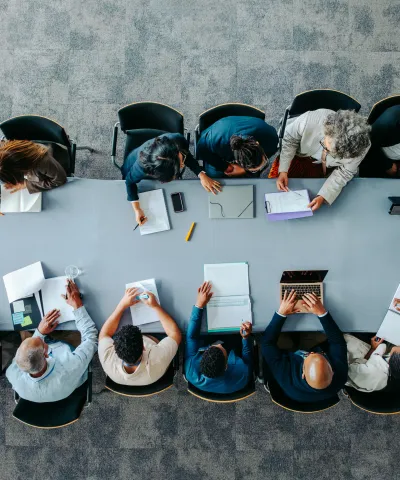people around the square table