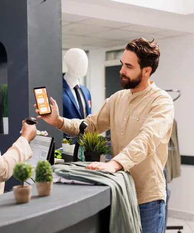 man paying to the counter