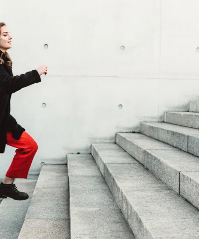 woman going up the stairs