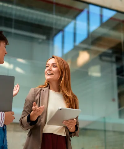 two women talking in the office