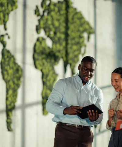 man and woman discussing a project