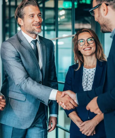 men and women having b2b growth meeting