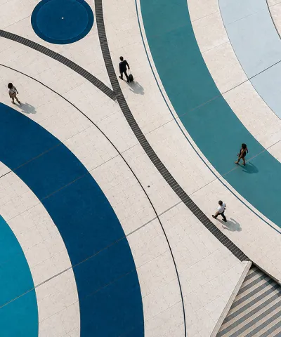people standing on swirls of blue