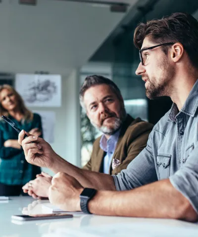 people having a meeting about growth economics
