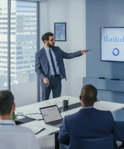employee showing a chart with price efficiency