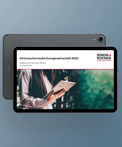 woman holding a screen reading