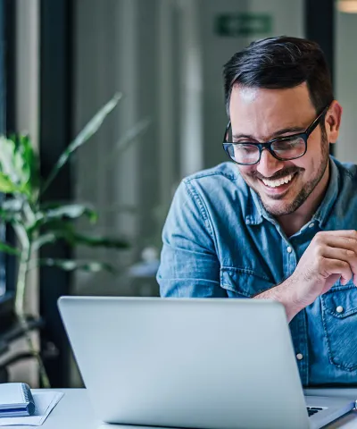 person looking at laptop