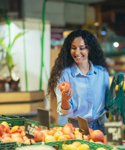 lady checking vegetables