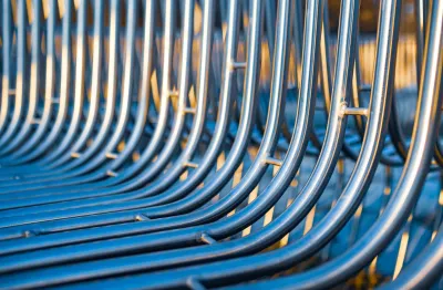 Image of metal barriers curving upwards as a metaphor for sales incentive plans