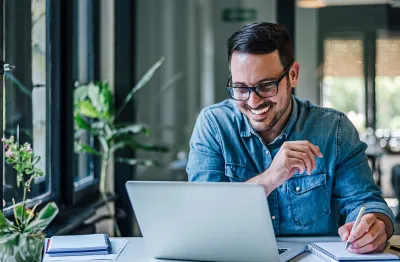person looking at laptop