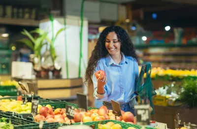 lady checking vegetables