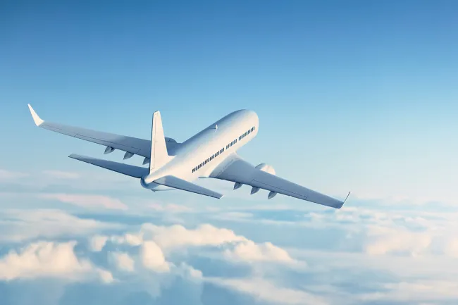 Commercial plane flying in the clouds