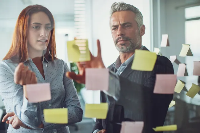 man and woman designing the customer journey