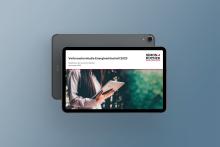 woman holding a tablet