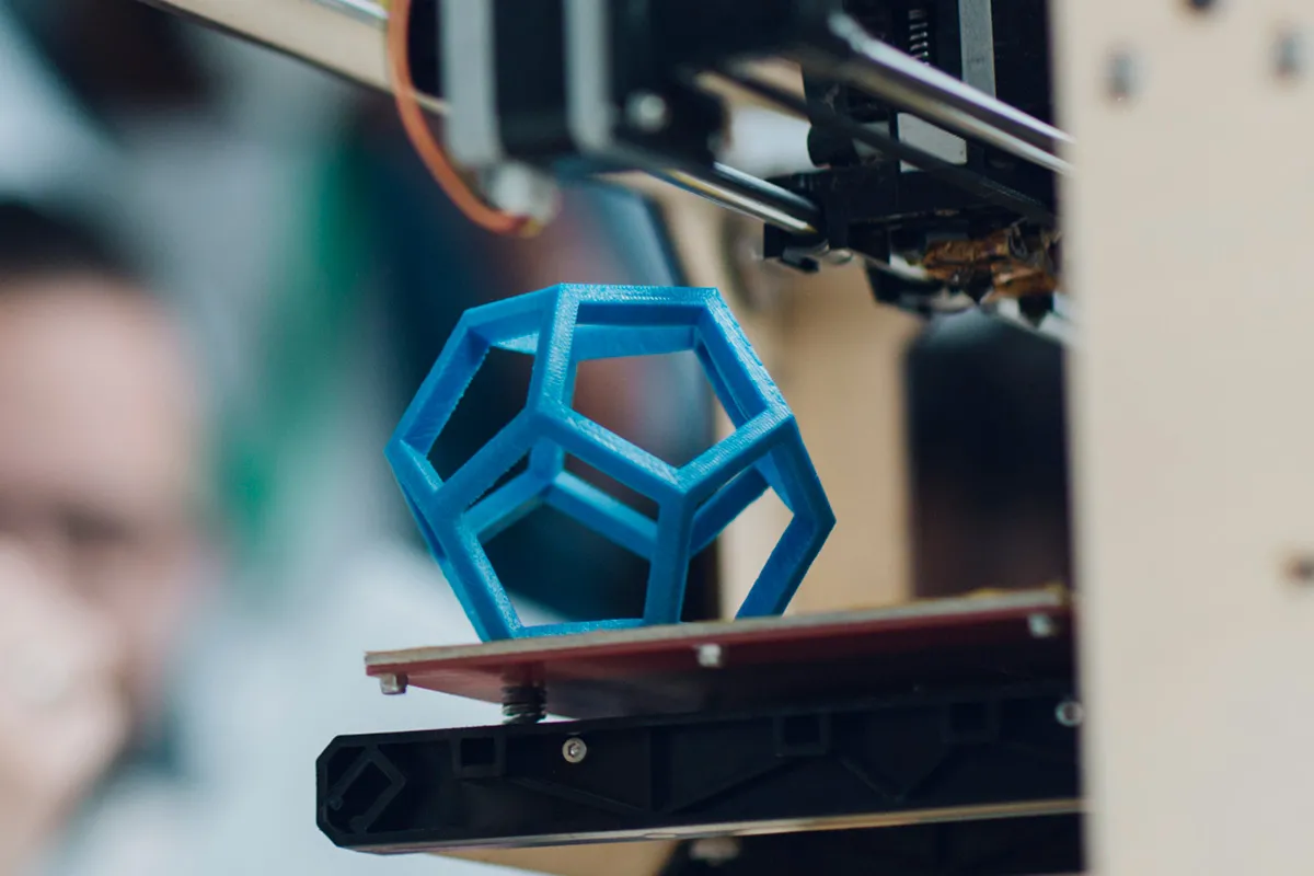 Close up of 3D printing a pentagonal prism