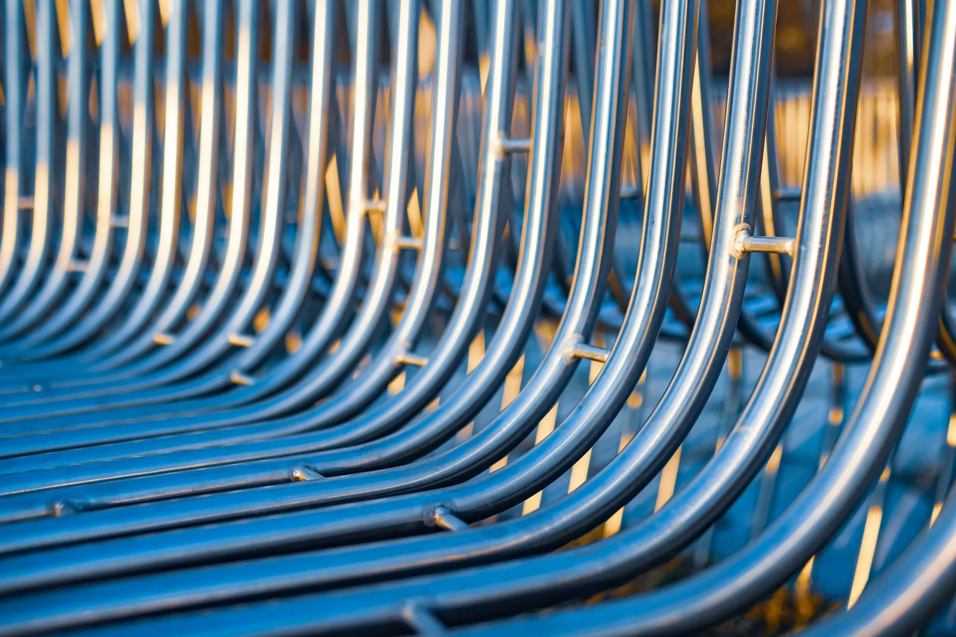 Image of metal barriers curving upwards as a metaphor for sales incentive plans