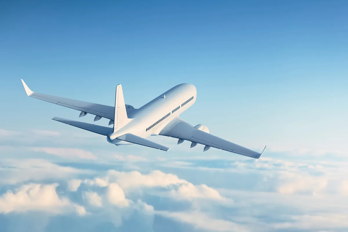 Commercial plane flying in the clouds