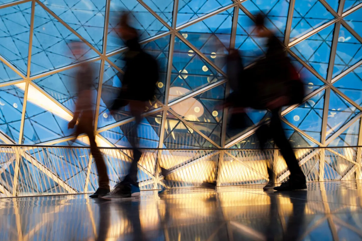 Blurred silhouettes of Professionals walking