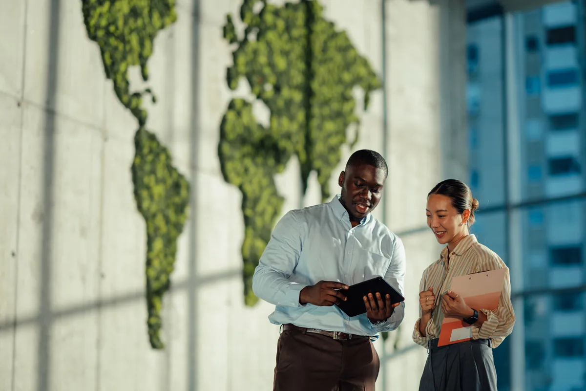 man and woman discussing a project