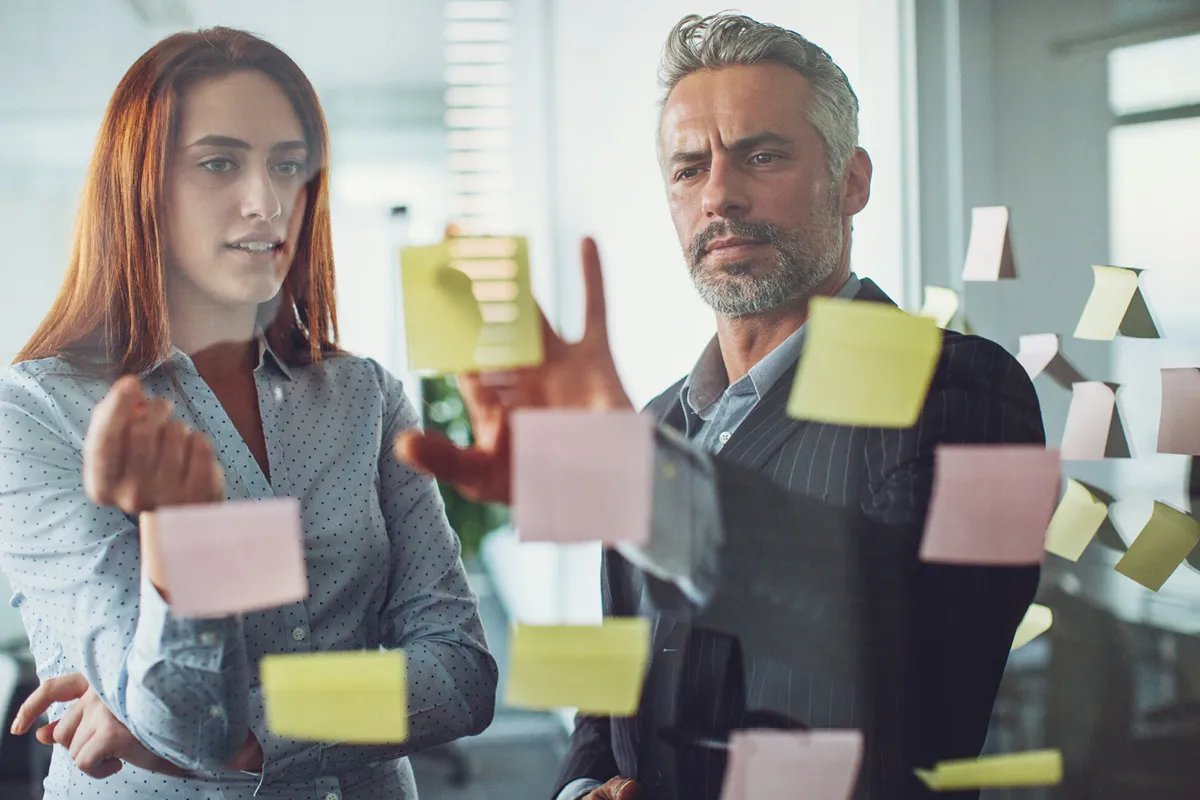 man and woman designing the customer journey