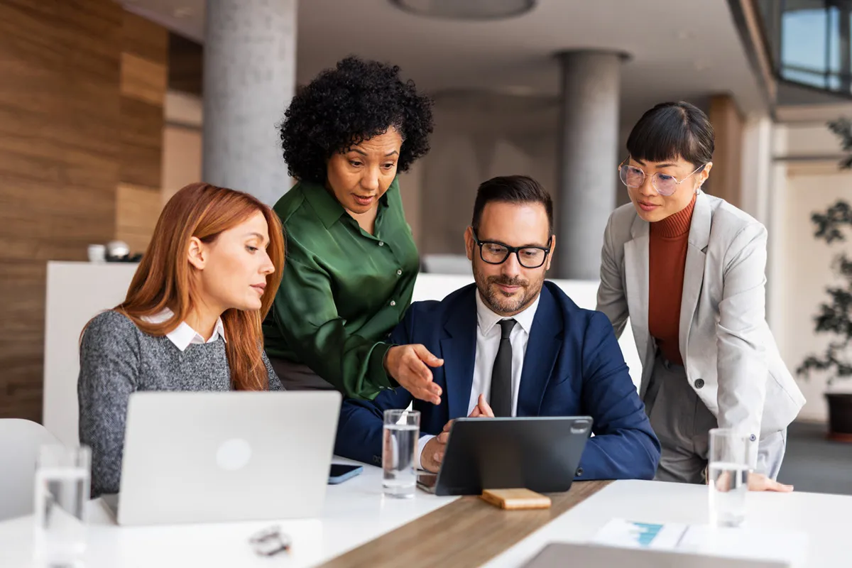 employees discussing profitability strategy