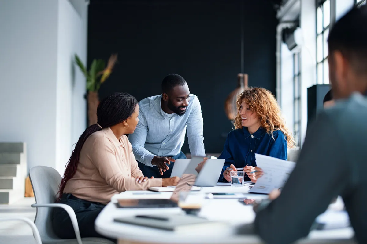 employees discussing sales plans