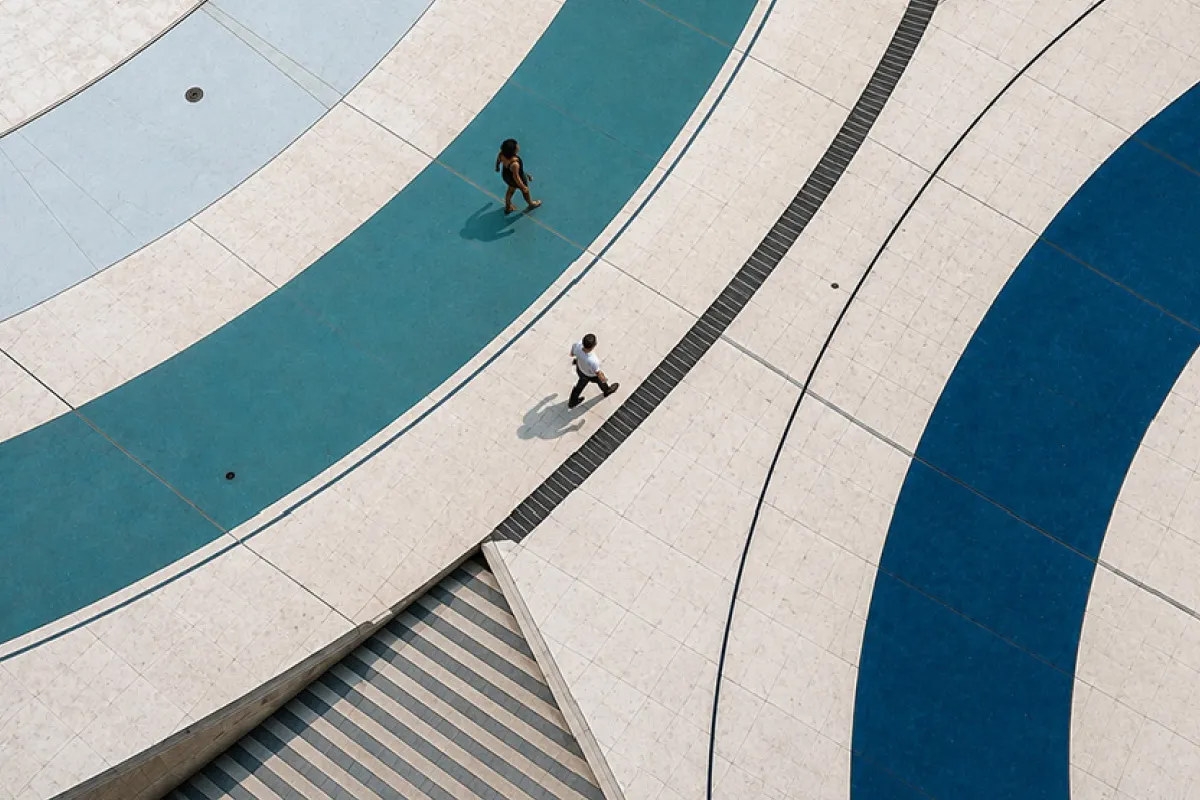 people on swirls of blue
