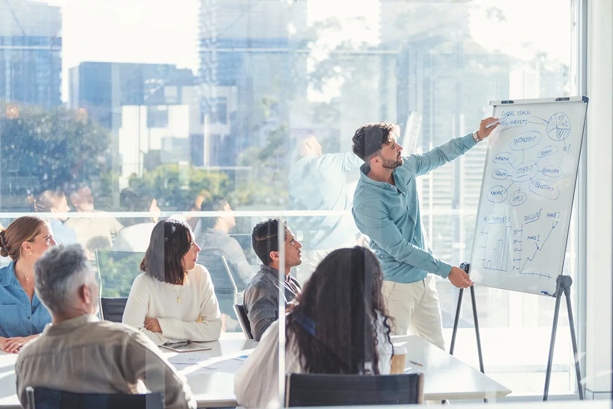 man explaining the sales model