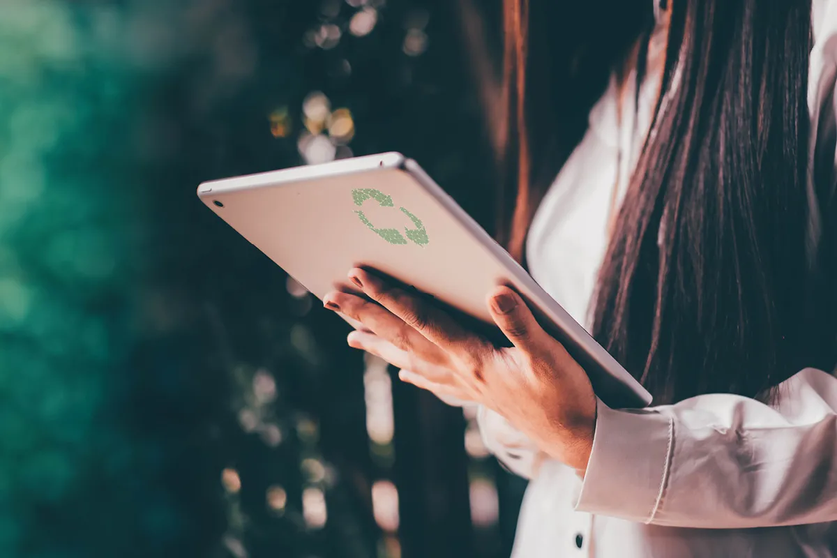 woman holding a tablet